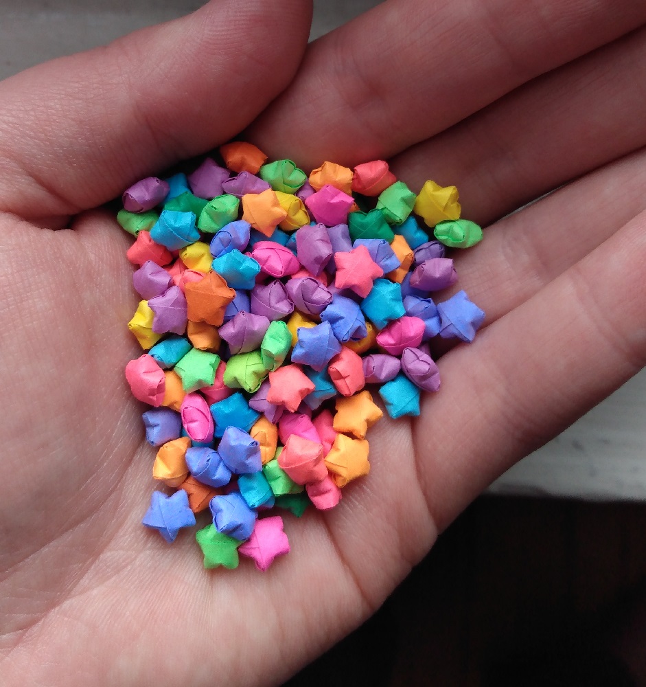 a handful of small multicolor paper stars