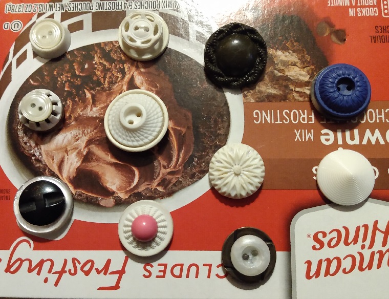11 pairs of buttons glued together