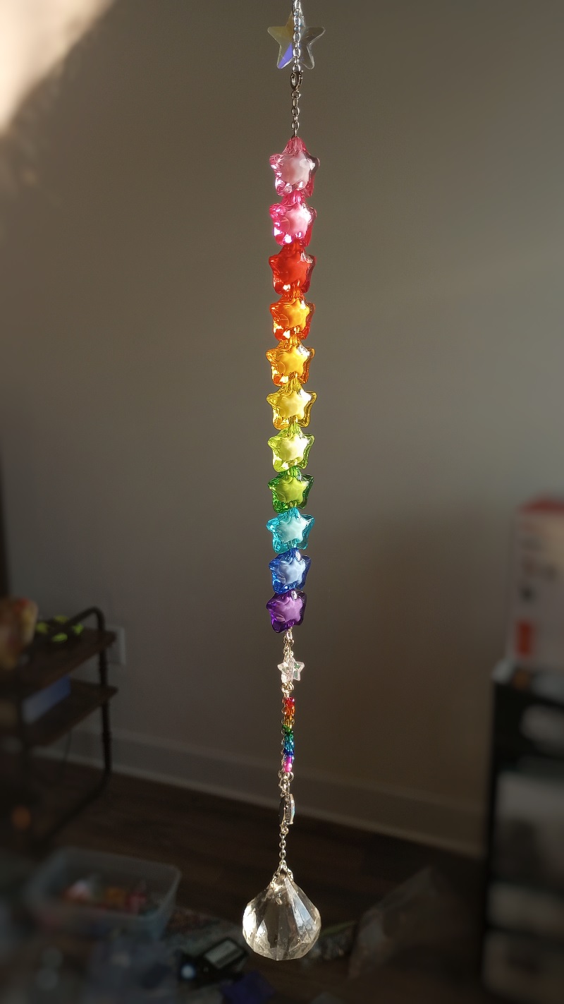 rainbow stars with a large crystal pendant