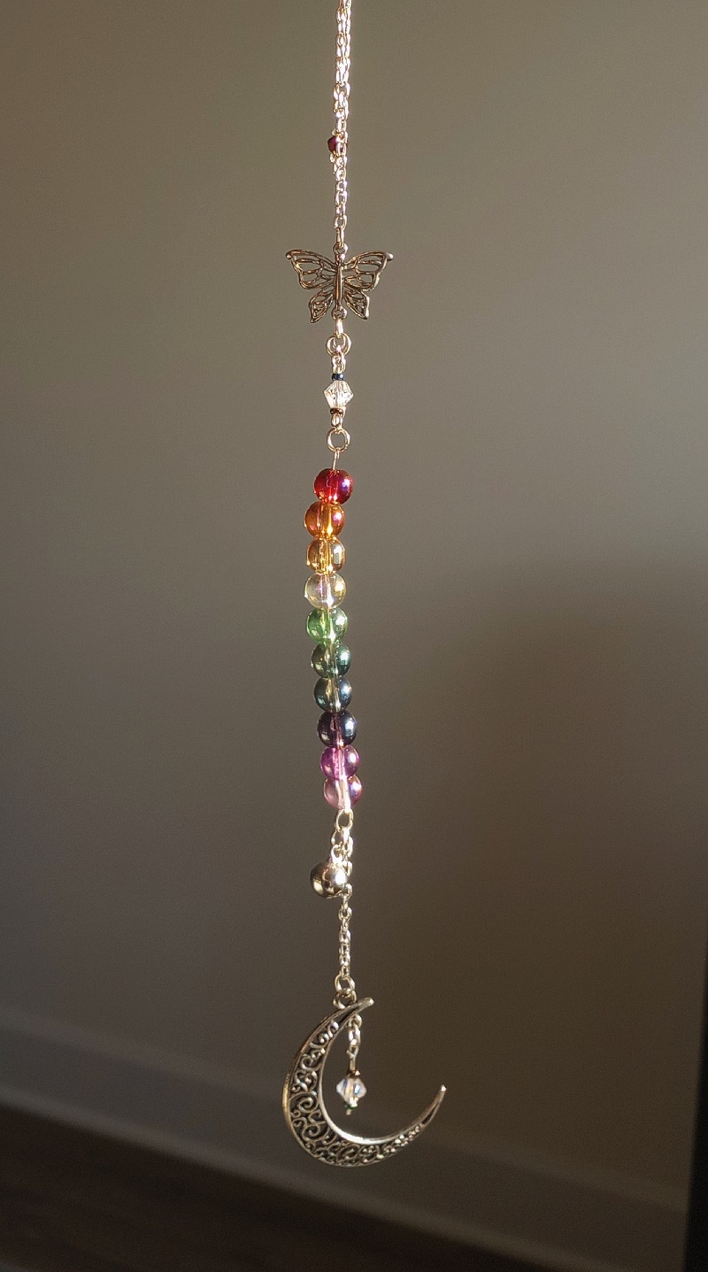 rainbow sun catcher with metal moon pendant