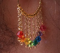 rainbow beads dangling from gold chain