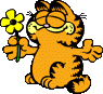 Garfield holding a flower with his arms outstretched.