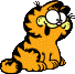 Garfield looking excitedly at the page.