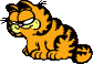 Garfield sitting and looking down with a small smile.