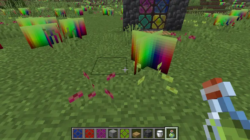 a screenshot featuring a few grass variants, including one that is a green tinted sample of rainbow colors.
