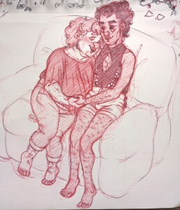 Red and black pen sketch of Mark and Lazaro cuddling on the couch, looking quite smitten as they hold hands and Mark tells Lazaro something. Mark is wearing cuffed jeans and a loose blouse while Lazaro is wearing white shorts and a black tank top with a diamond shaped hole exposing his chest. 