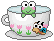 white teacup with a small frog peaking out of it