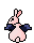 pale pink bunny with black bat wings, sitting away from viewer.