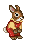 brown bunny wearing a yellow shirt and red overalls.
