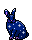 Dark blue bunny sitting. It has white stars and purple accents.