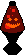 dark red lavalamp with orange wax and an orange jack-o-lantern face.